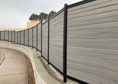 Fence Mounted to Retaining Wall