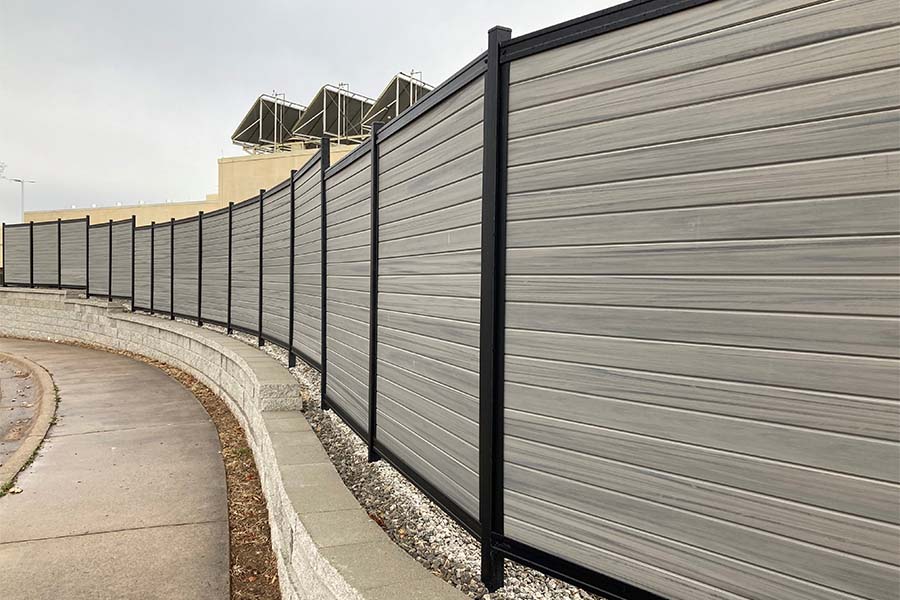 Fence Mounted to Retaining Wall