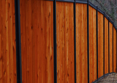 FenceTrac With Stained Wood Fence