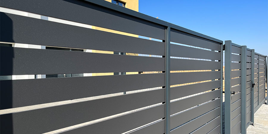 galvanized metal slat fence