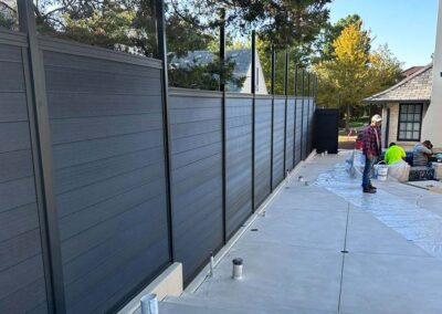 Black LuxeCore Composite Horizontal Fence Under Construction